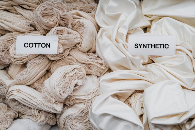 cotton and synthetic rags side-by-side with labels and a clean background.